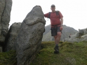 Mark loves posing next to that rock