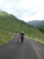 Irene pushing her bike