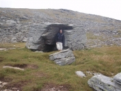 Kenny sheltering in a rock