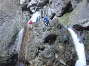 Robin and Mark climbing up the waterfall
